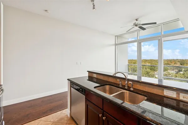a kitchen with a sink and a window
