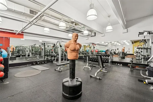 a view of a room with gym equipment