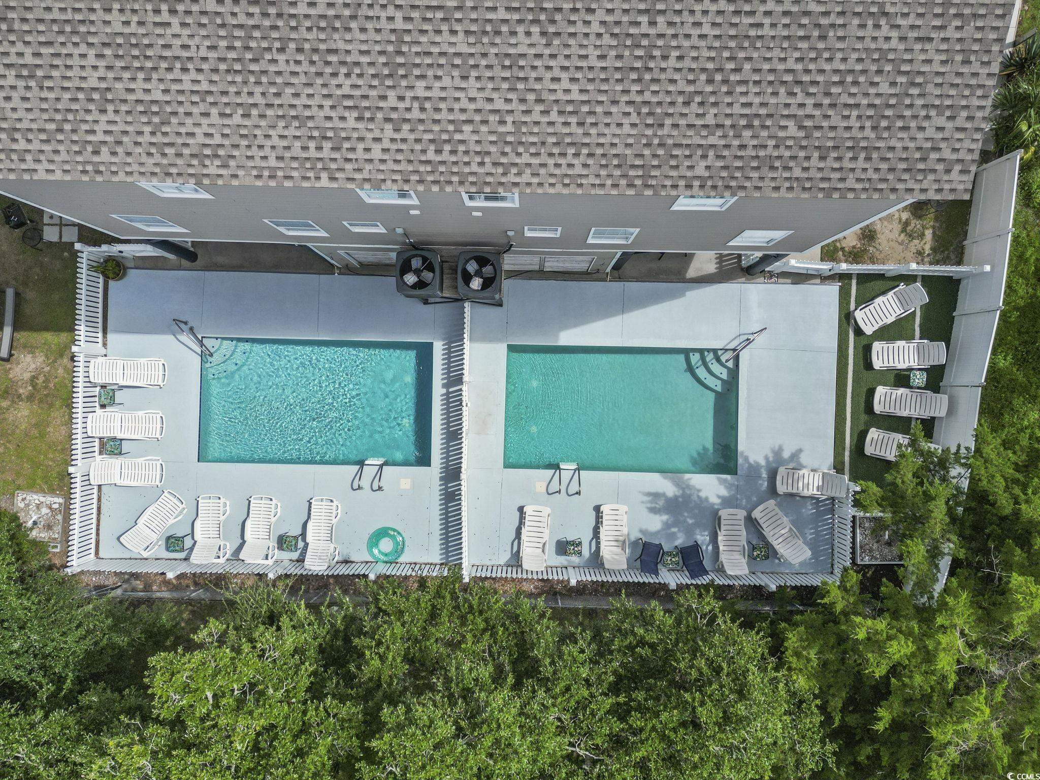 105 B Woodland Drive Murrells Inlet, SC 29576 - Photo 17 of 21 Bird's eye view of a pool