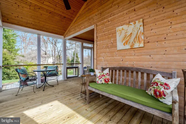 a view of a park with large trees