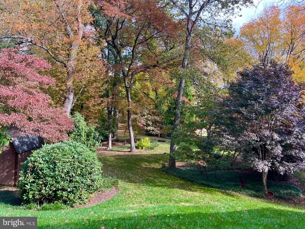workspace with wooden floor and windows