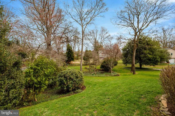 a view of a golf course with a swimming pool