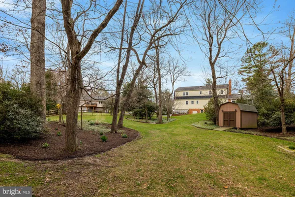 a view of a pathway both side of yard
