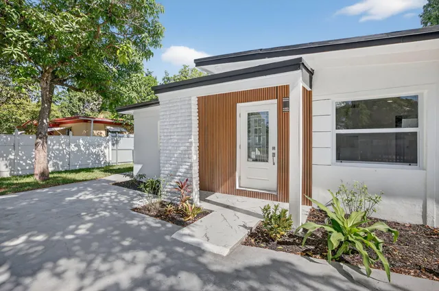 a view of backyard with green space