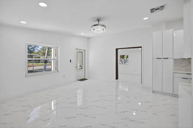 a front view of house with a yard and garage