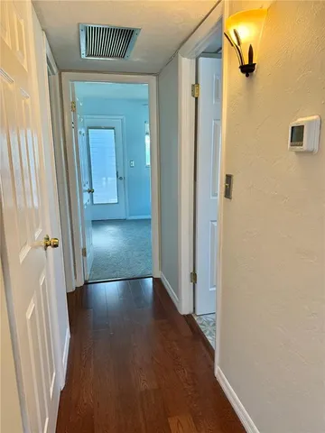 a view of a car in front of a house