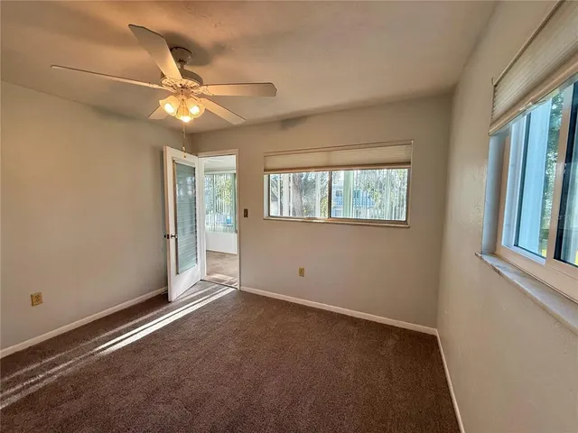 a view of a lake with houses in the back