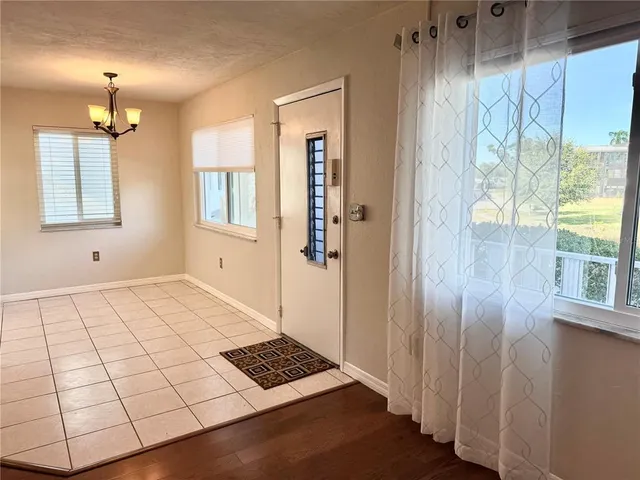 a kitchen with stainless steel appliances a sink and a refrigerator