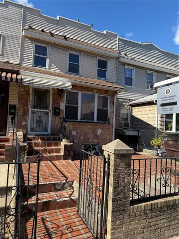 front view of a house with a street