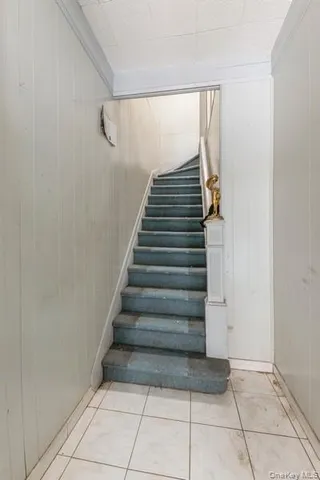 a view of entryway with stairs