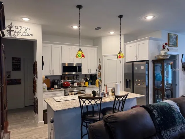 a view of a dining room with furniture