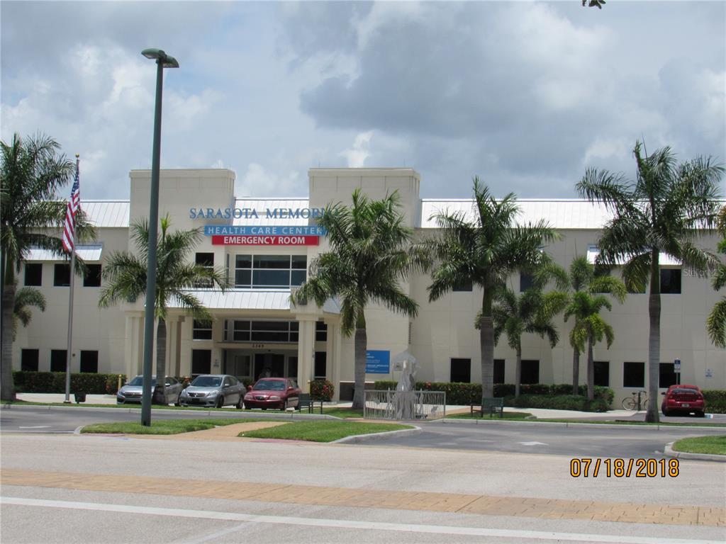 Jason St Port North Port, FL 34288 - Photo 12 of 13 a front view of a building with tree s