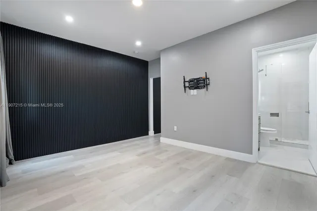 wooden floor and windows in an empty room