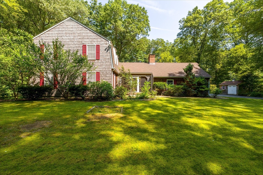 131 Kelly Road Northbridge, MA 01534 - Photo 36 of 41 a view of a house next to a big yard and large trees