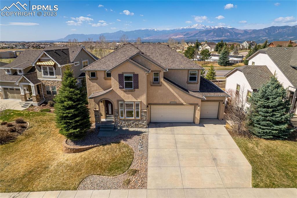 2423 Cinnabar Road Colorado Springs, CO 80921 - Photo 36 of 40 a view of a house with a yard