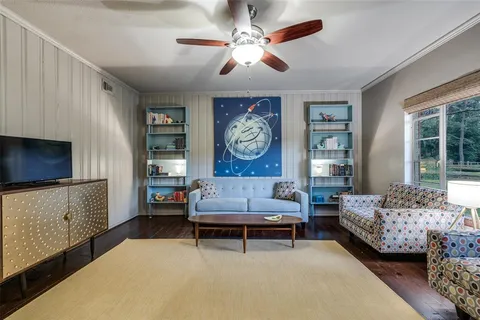 a outdoor living space with patio furniture and a potted plant