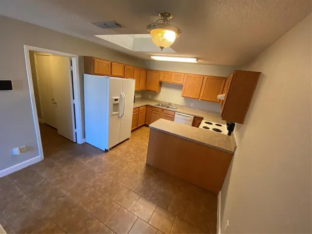 a view of a storage & utility room with washer and dryer