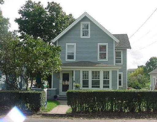64 Hackley Street Bridgeport, CT 06605 - Photo 1 of 1 a front view of a house with a yard