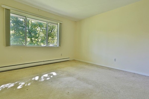 74 Beach Street, Unit 211 Woburn, MA 01801 - Photo 7 of 14 a view of a room with window