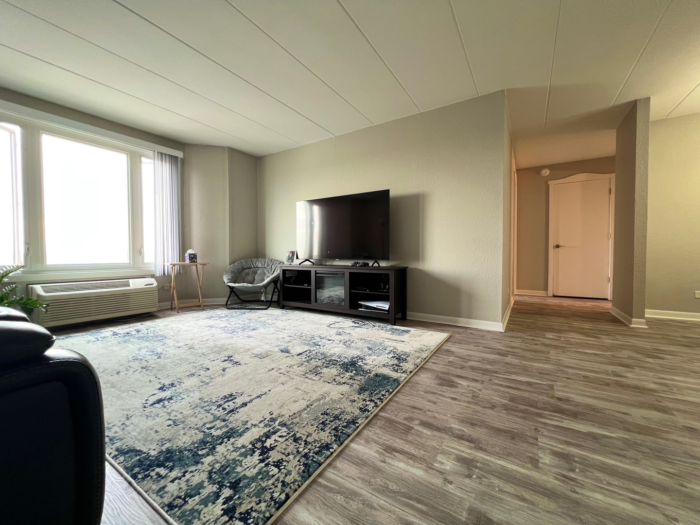 1 Renaissance Place, Unit 719 Palatine, IL 60067 - Photo 12 of 34 a bedroom with a bed and wooden floor