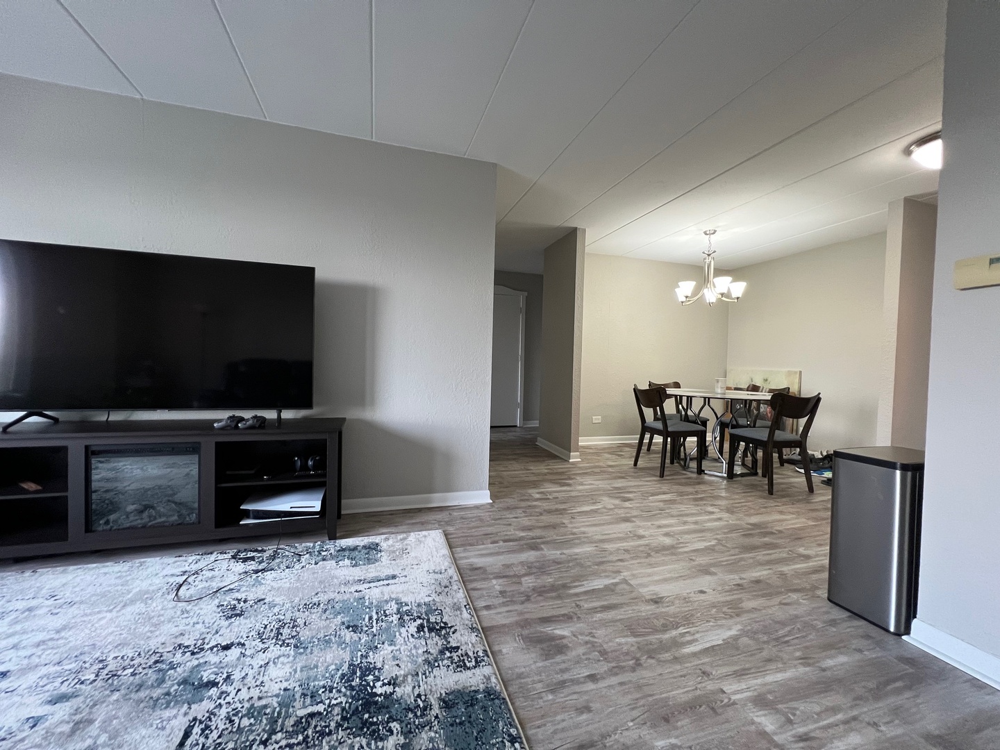 1 Renaissance Place, Unit 719 Palatine, IL 60067 - Photo 13 of 34 a living room with furniture and a flat screen tv