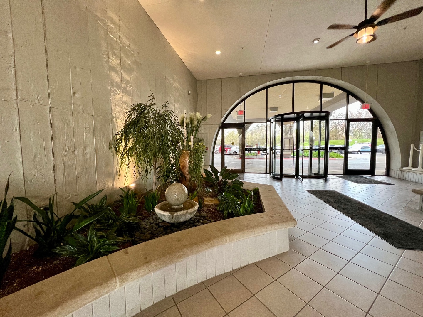 1 Renaissance Place, Unit 719 Palatine, IL 60067 - Photo 4 of 34 an entryway with flower pots
