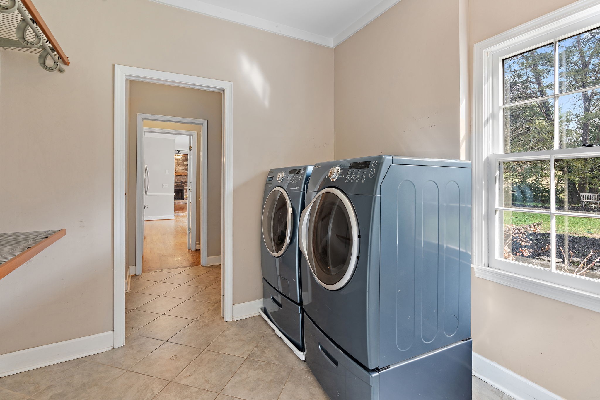 6916 Sunderland Circle Nashville, TN 37221 - Photo 18 of 43 a utility room with dryer and washer