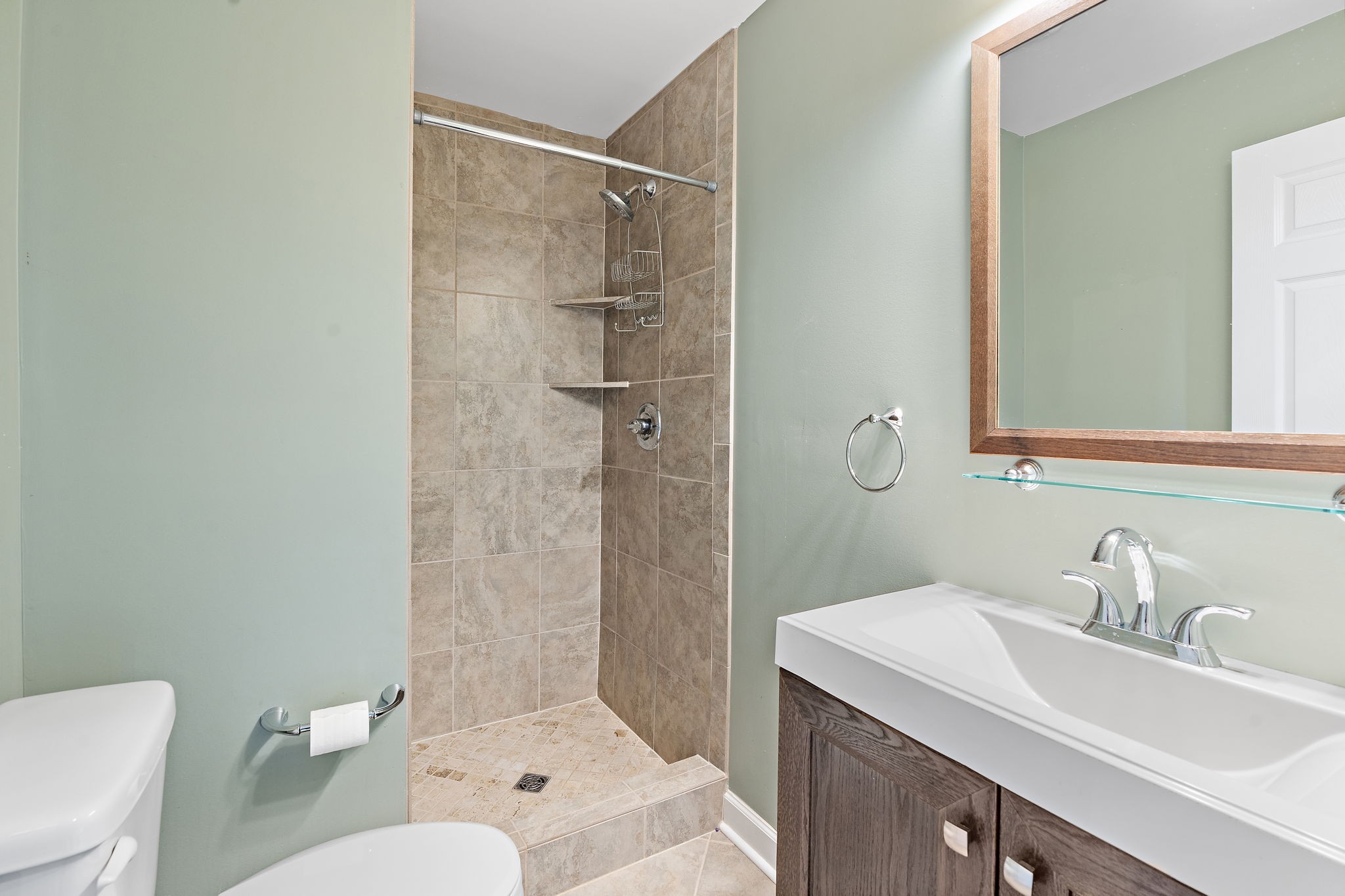 6916 Sunderland Circle Nashville, TN 37221 - Photo 21 of 43 a bathroom with a sink toilet and shower