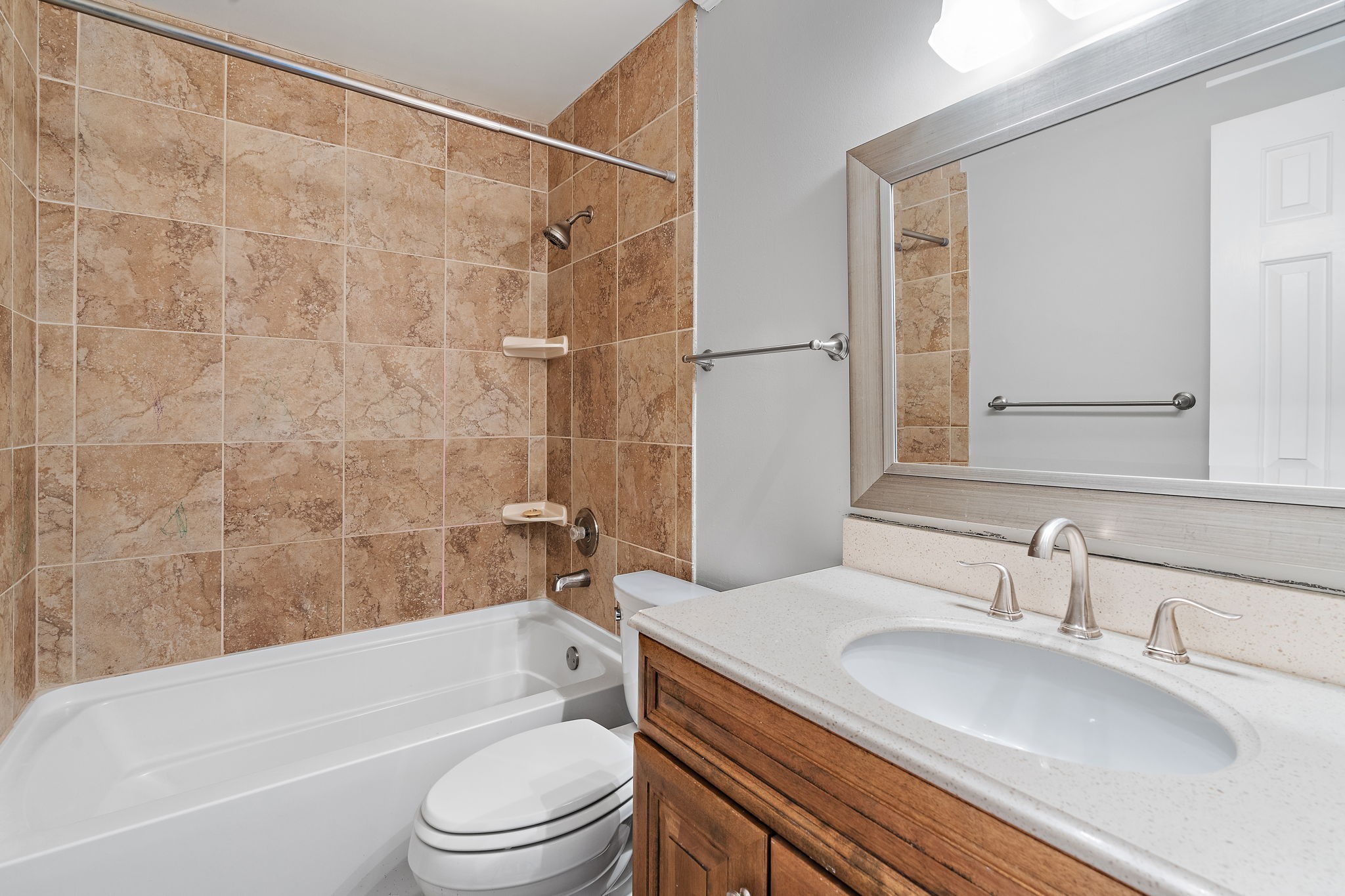 6916 Sunderland Circle Nashville, TN 37221 - Photo 22 of 43 a bathroom with a sink toilet and shower