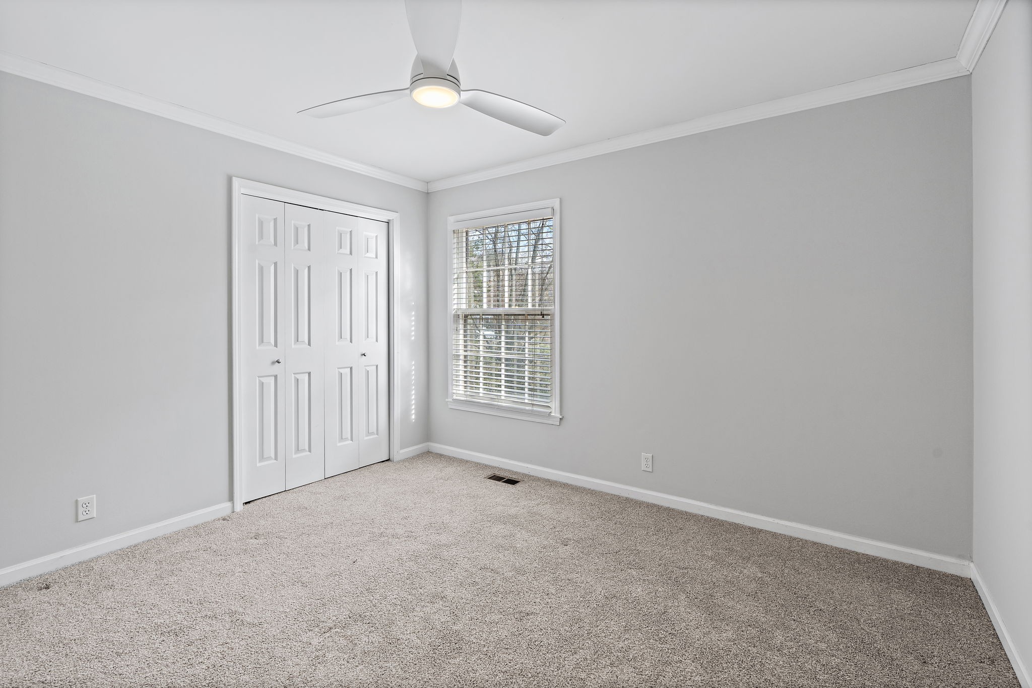 6916 Sunderland Circle Nashville, TN 37221 - Photo 23 of 43 a view of an empty room with a window