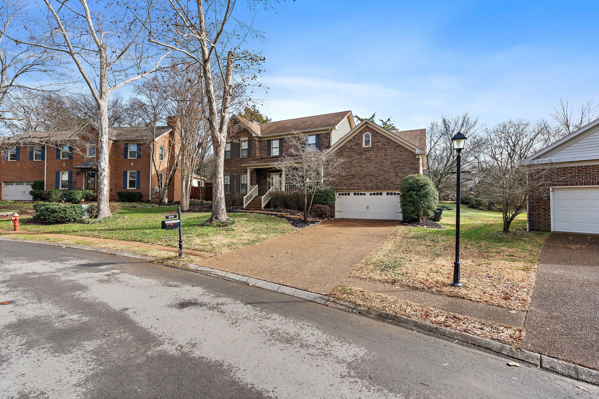 6916 Sunderland Circle Nashville, TN 37221 - Photo 3 of 43 a view of a house with a yard