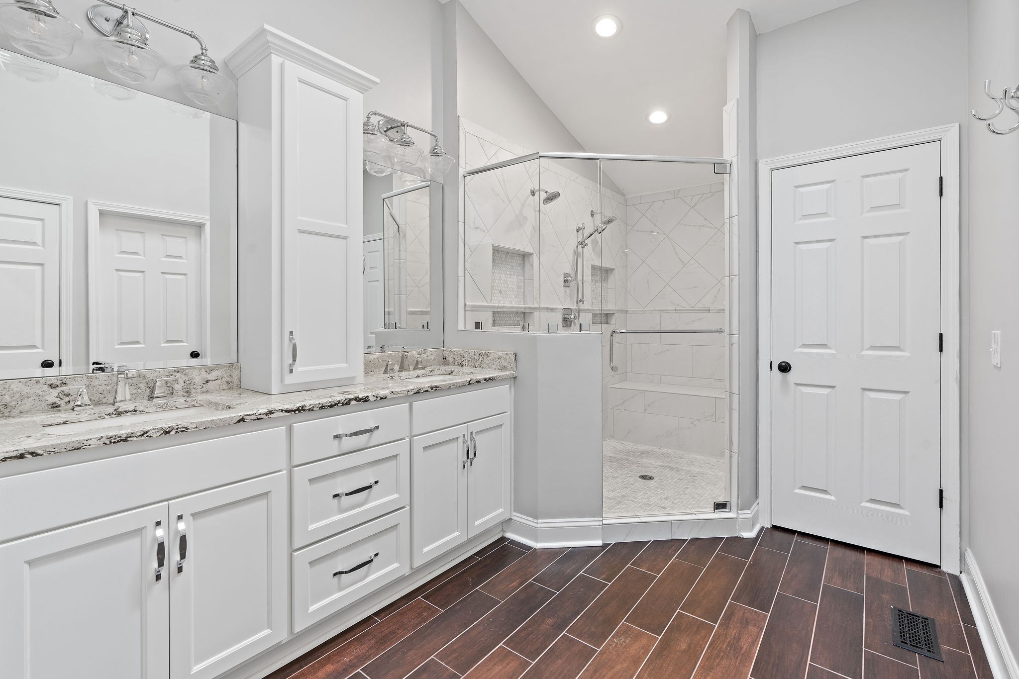 6916 Sunderland Circle Nashville, TN 37221 - Photo 31 of 43 a bathroom with a granite countertop sink mirror and a