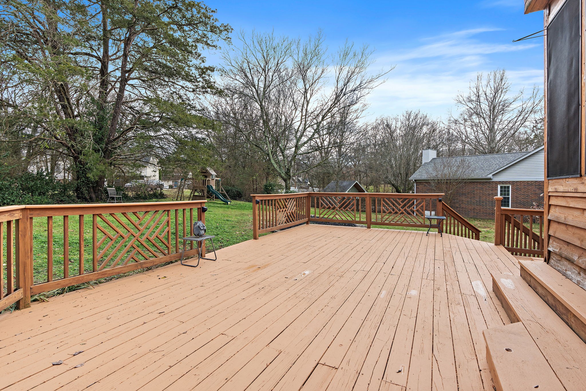 6916 Sunderland Circle Nashville, TN 37221 - Photo 38 of 43 a view of balcony with wooden floor and fence
