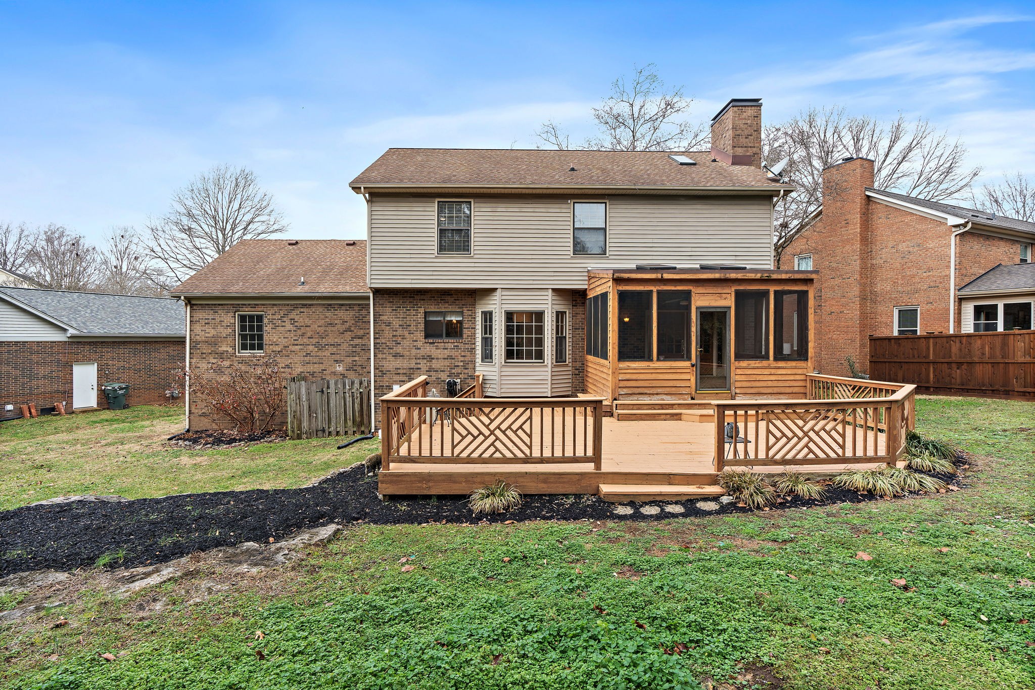 6916 Sunderland Circle Nashville, TN 37221 - Photo 40 of 43 a front view of a house with a garden