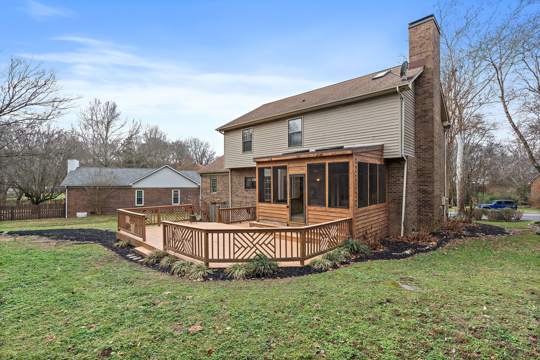6916 Sunderland Circle Nashville, TN 37221 - Photo 42 of 43 front view of a house with a yard