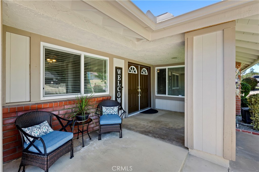 8527 Hillside Road Rancho Cucamonga, CA 91701 - Photo 6 of 50 a outdoor living space with furniture and a potted plant