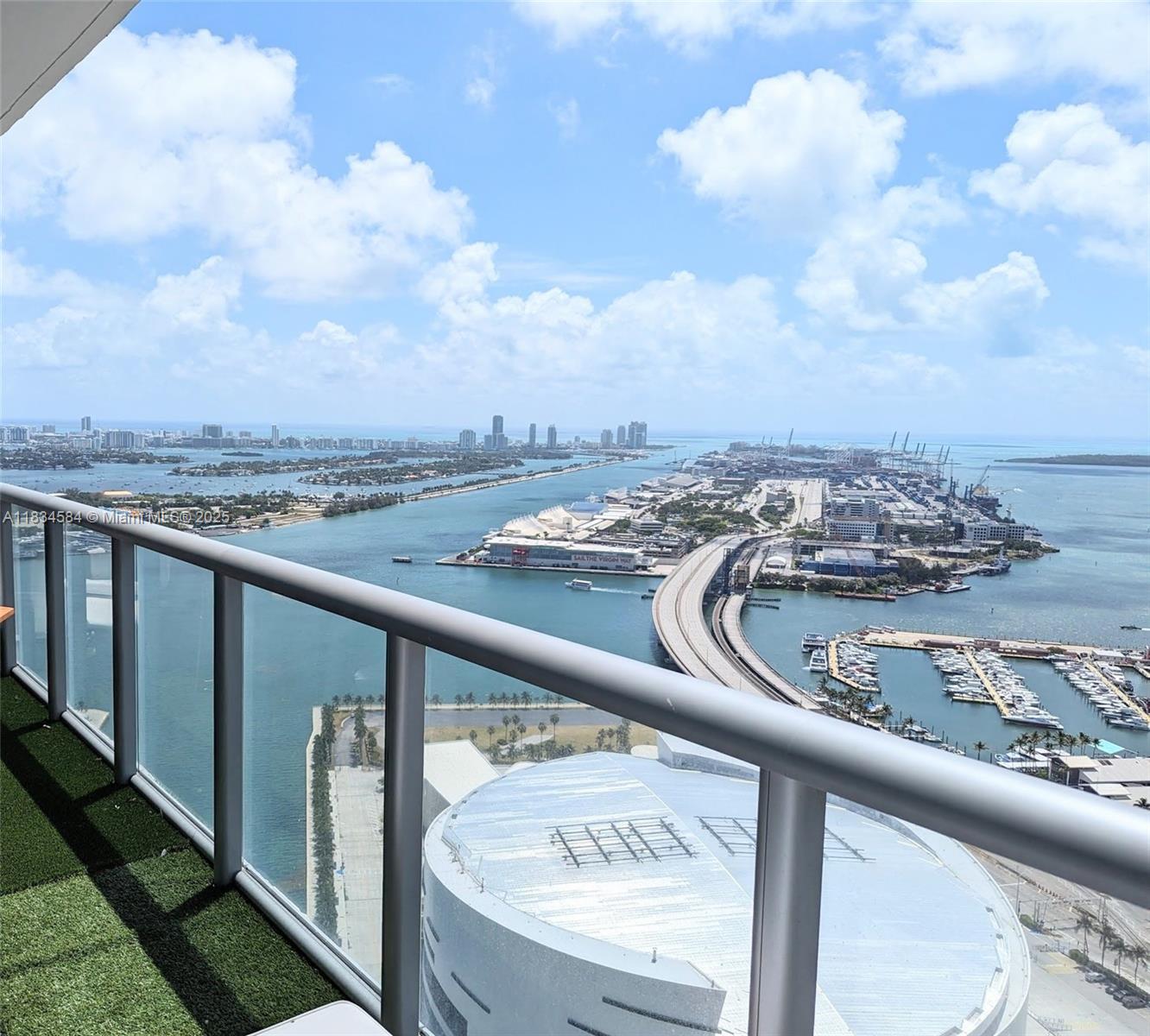 888 Biscayne Boulevard, Unit 4702 Miami, FL 33132 - Photo 14 of 27 a view of a city from a balcony