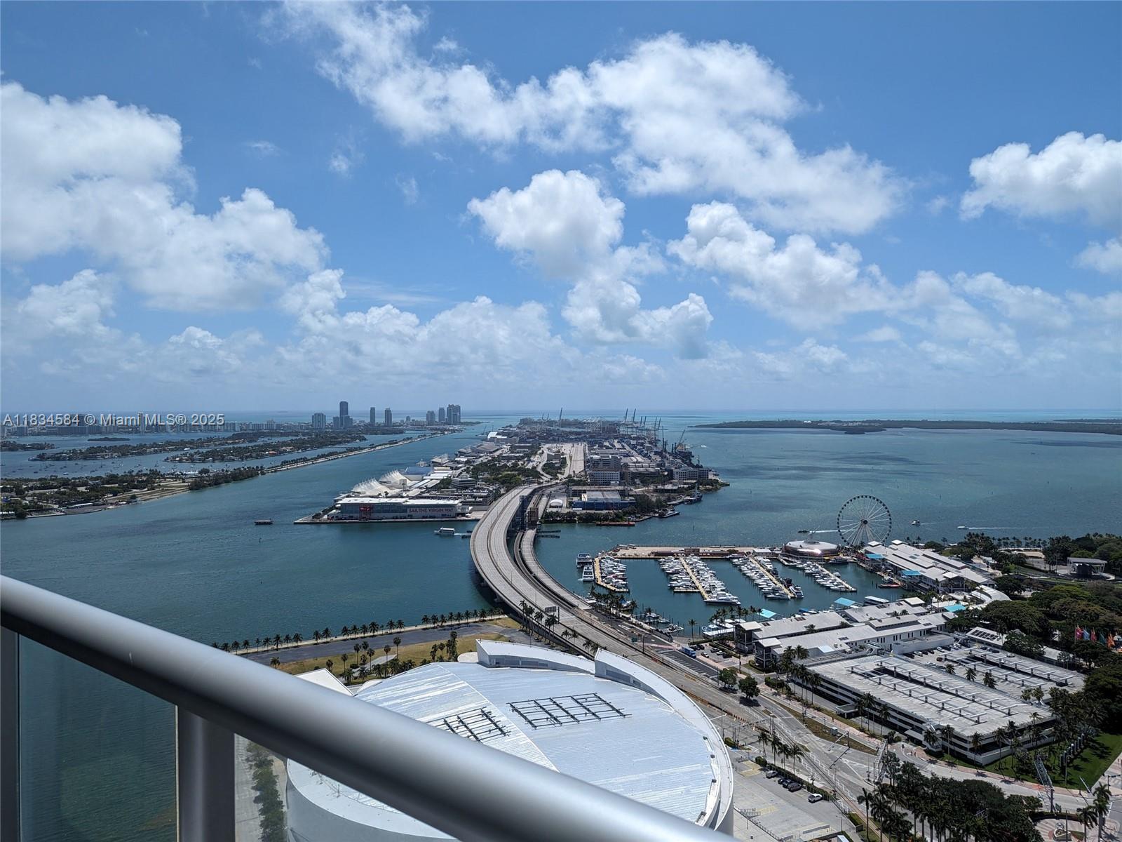 888 Biscayne Boulevard, Unit 4702 Miami, FL 33132 - Photo 21 of 27 a view of a lake with a city