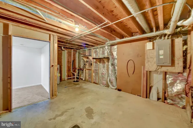 a view of a room with wooden walls