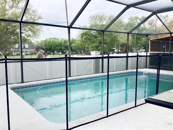 a view of outdoor space with wooden floor