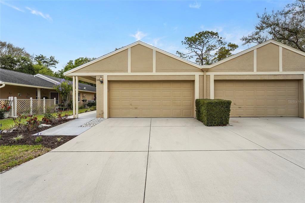 396 Chartley Court South Sarasota, FL 34232 - Photo 1 of 1 a front view of a house with a garage