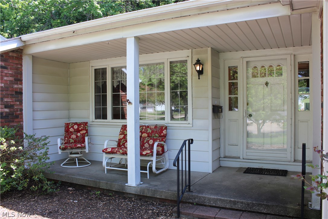 943 Roland Road Lyndhurst, OH 44124 - Photo 2 of 17 Relaxing time on the front porch