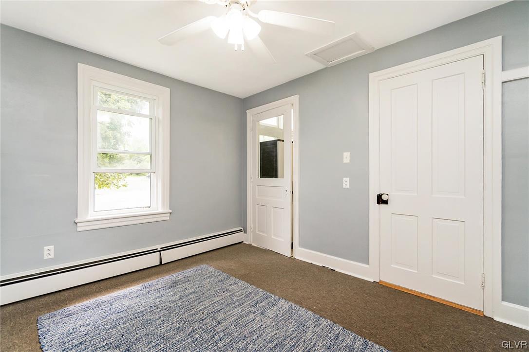 568 Bushkill Center Road Nazareth, PA 18064 - Photo 33 of 45 a view of an empty room with wooden floor and a window