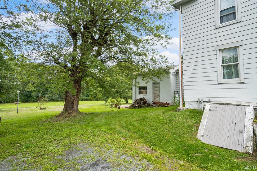 568 Bushkill Center Road Nazareth, PA 18064 - Photo 39 of 45 a view of a backyard with a garden and entertaining space