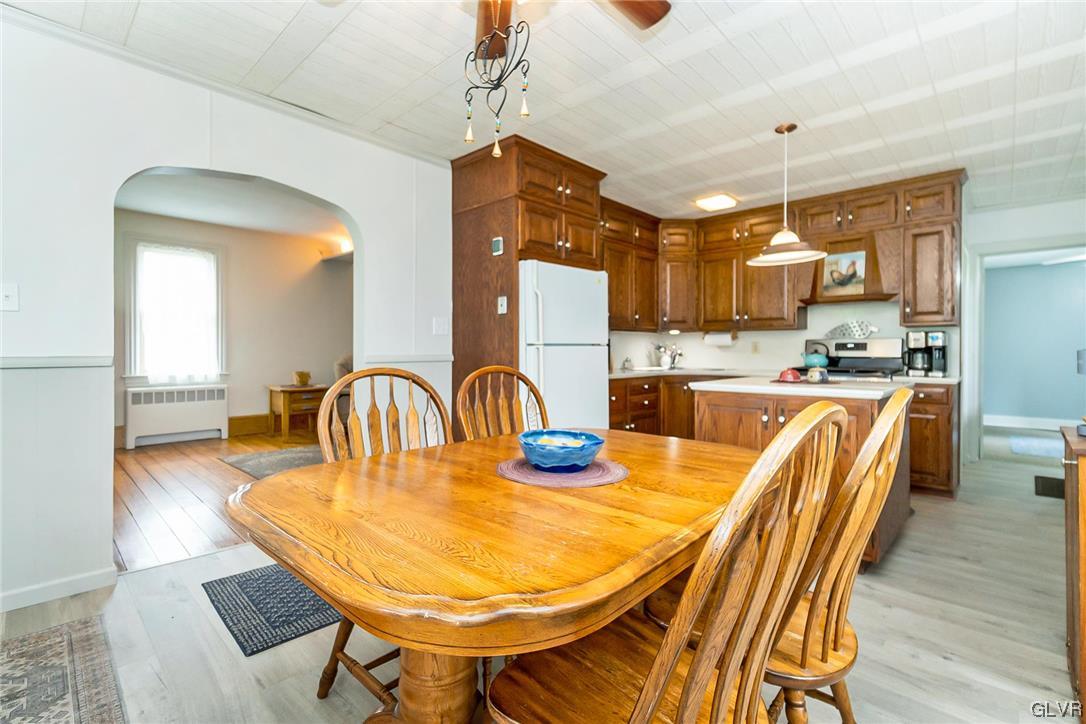 568 Bushkill Center Road Nazareth, PA 18064 - Photo 8 of 45 a dining room with stainless steel appliances furniture a table and chairs