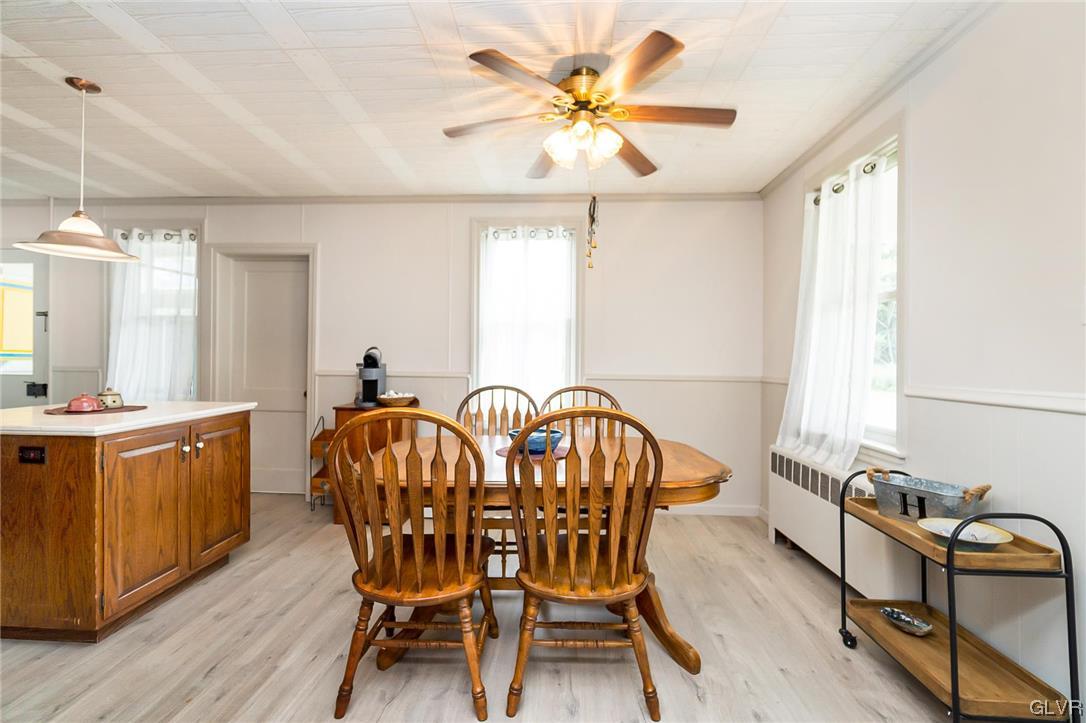 568 Bushkill Center Road Nazareth, PA 18064 - Photo 9 of 45 a view of a dining room with furniture and a chandelier