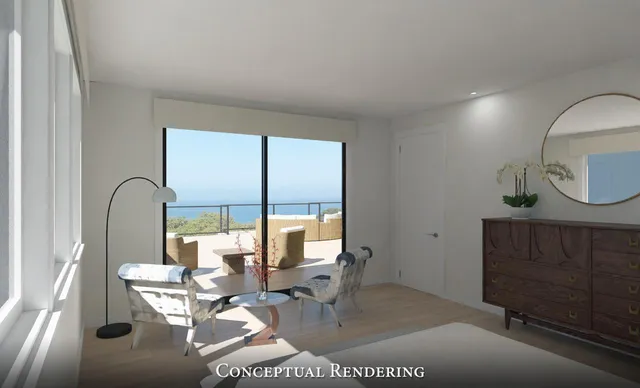a view of a dining room with furniture a chandelier and wooden floor
