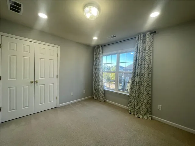 a bathroom with a sink double vanity and shower