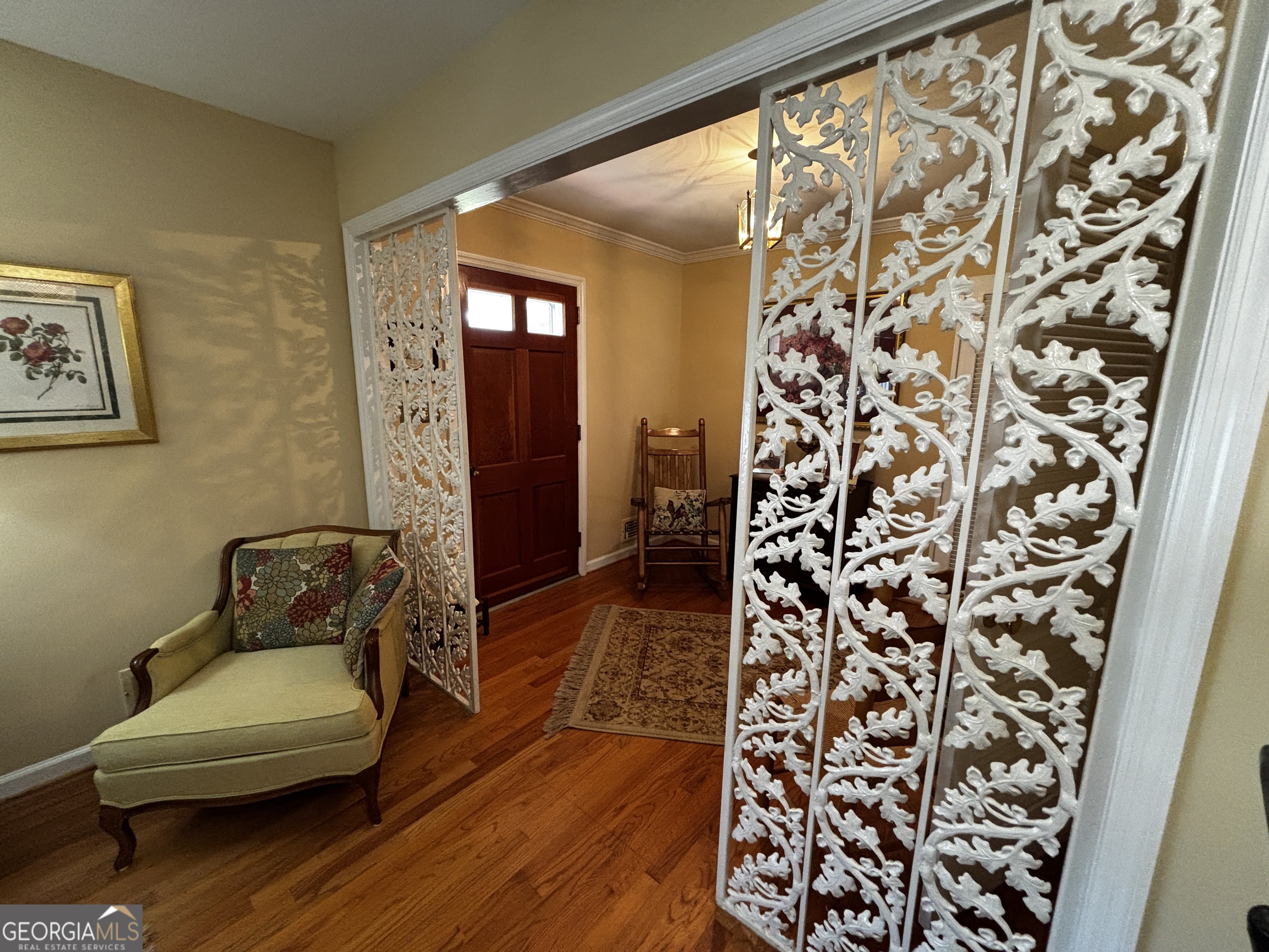 207 Old Thomson Road Wrens, GA 30833 - Photo 12 of 46 a bedroom with a bed and a couch