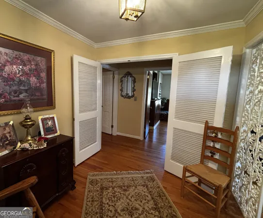 a living room with furniture and a rug